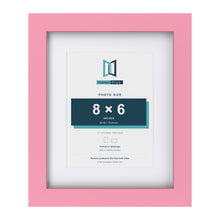 Baby Pink 11 x 9 inch picture frame with a white mount for an 8 x 6 inch photo