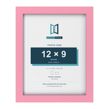Baby Pink 14 x 11 inch picture frame with a white mount for a 12 x 9 inch photo