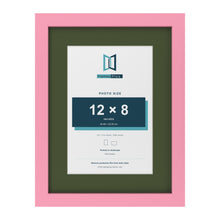Baby Pink 16 x 12 inch picture frame with a green mount for a 12 x 8 inch photo