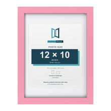 Baby Pink 16 x 12 inch picture frame with a white mount for a 12 x 10 inch photo