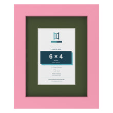 Baby Pink 9 x 7 inch picture frame with a green mount for a 6 x 4 inch photo