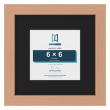 Beech 10 x 10 inch picture frame with a black mount for a 6 x 6 inch photo