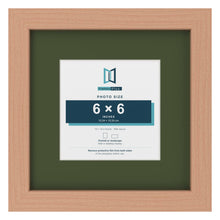 Beech 10 x 10 inch picture frame with a green mount for a 6 x 6 inch photo
