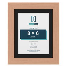 Beech 10 x 8 inch picture frame with a black mount for an 8 x 6 inch photo
