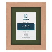 Beech 10 x 8 inch picture frame with a green mount for a 7 x 5 inch photo