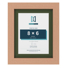 Beech 10 x 8 inch picture frame with a green mount for an 8 x 6 inch photo