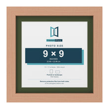 Beech 11 x 11 inch picture frame with a green mount for a 9 x 9 inch photo