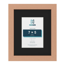 Beech 11 x 9 inch picture frame with a black mount for a 7 x 5 inch photo