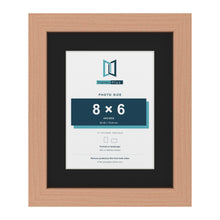 Beech 11 x 9 inch picture frame with a black mount for an 8 x 6 inch photo
