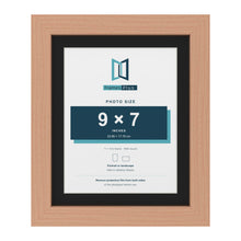 Beech 11 x 9 inch picture frame with a black mount for a 9 x 7 inch photo