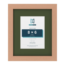 Beech 12 x 10 inch picture frame with a green mount for an 8 x 6 inch photo