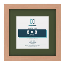Beech 12 x 12 inch picture frame with a green mount for an 8 x 8 inch photo
