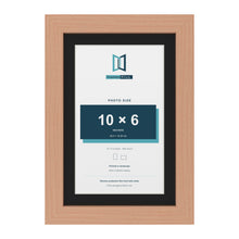 Beech 12 x 8 inch picture frame with a black mount for a 10 x 6 inch photo