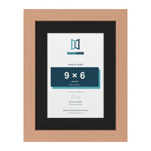 Beech 12 x 9 inch picture frame with a black mount for a 9 x 6 inch photo