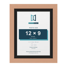 Beech 14 x 11 inch picture frame with a black mount for a 12 x 9 inch photo