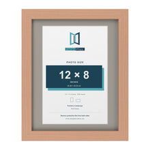Beech 14 x 11 inch picture frame with a Dawn Grey mount for a 12 x 8 inch photo