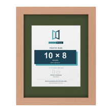 Beech 14 x 11 inch picture frame with a green mount for a 10 x 8 inch photo