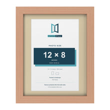 Beech 14 x 11 inch picture frame with an ivory mount for a 12 x 8 inch photo