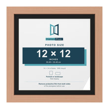 Beech 14 x 14 inch picture frame with a black mount for a 12 x 12 inch photo