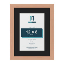 Beech 16 x 12 inch picture frame with a black mount for a 12 x 8 inch photo