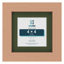 Beech 6 x 6 inch picture frame with a green mount for a 4 x 4 inch photo