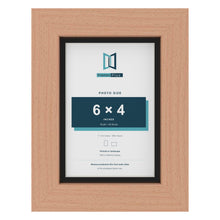 Beech 7 x 5 inch picture frame with a black mount for a 6 x 4 inch photo