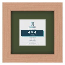 Beech 7 x 7 inch picture frame with a green mount for a 4 x 4 inch photo