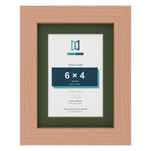 Beech 8 x 6 inch picture frame with a green mount for a 6 x 4 inch photo