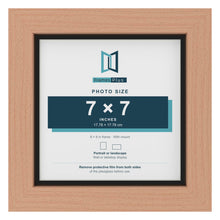 Beech 8 x 8 inch picture frame with a black mount for a 7 x 7 inch photo