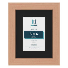 Beech 9 x 7 inch picture frame with a black mount for a 6 x 4 inch photo