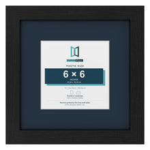 Black 10 x 10 inch picture frame with a Pacific Blue mount for a 6 x 6 inch photo