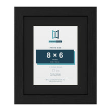 Black 11 x 9 inch picture frame with a black mount for an 8 x 6 inch photo