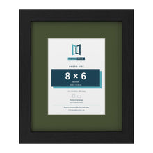 Black 12 x 10 inch picture frame with a green mount for an 8 x 6 inch photo