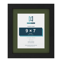 Black 12 x 10 inch picture frame with a green mount for a 9 x 7 inch photo