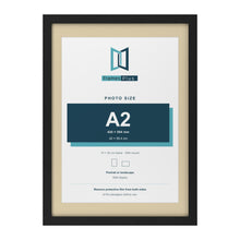 Black 70 x 50 cm picture frame with an ivory mount for an A2 photo