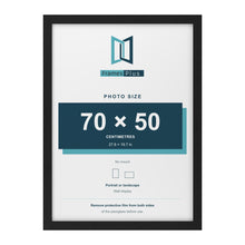 Black picture frame for a 70 x 50 cm photo