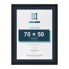 Black 80 x 60 cm picture frame with a Pacific Blue mount for a 70 x 50 cm photo