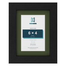 Black 8 x 6 inch picture frame with a green mount for a 6 x 4 inch photo