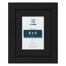 Black 9 x 7 inch picture frame with a black mount for a 6 x 4 inch photo