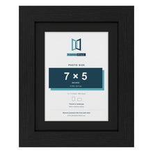 Black 9 x 7 inch picture frame with a black mount for a 7 x 5 inch photo