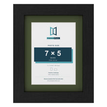 Black 9 x 7 inch picture frame with a green mount for a 7 x 5 inch photo