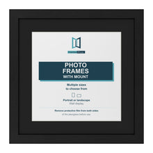 Black picture frame with a black mount