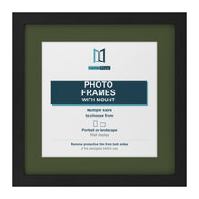 Black picture frame with a green mount