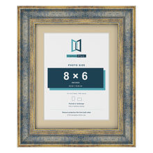 Cassis Blue 10 x 8 inch picture frame with an ivory mount for an 8 x 6 inch photo