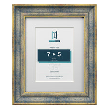 Cassis Blue 10 x 8 inch picture frame with a white mount for a 7 x 5 inch photo