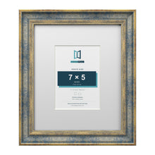 Cassis Blue 12 x 10 inch picture frame with a white mount for a 7 x 5 inch photo