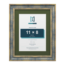 Cassis Blue 14 x 11 inch picture frame with a green mount for an 11 x 8 inch photo