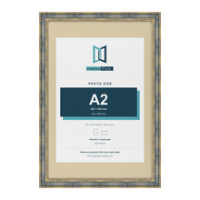 Cassis Blue 30 x 20 inch picture frame with an ivory mount for an A2 photo