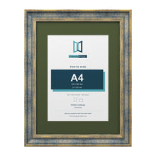 Cassis Blue 40 x 30 cm picture frame with a green mount for an A4 photo