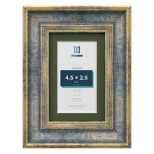 Cassis Blue 6 x 4 inch picture frame with a green mount for a 4.5 x 2.5 inch photo
